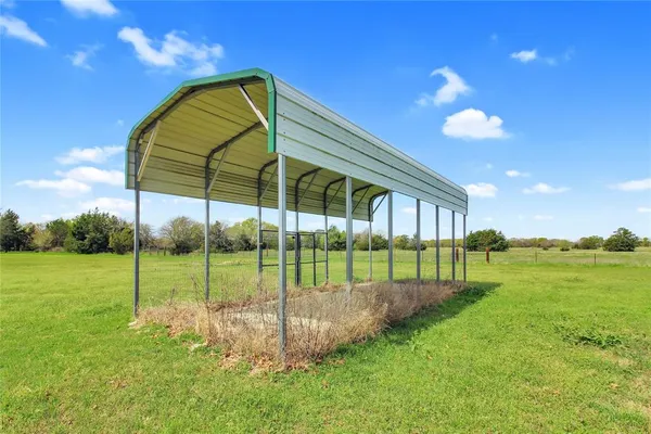 a view of room with wooden walls