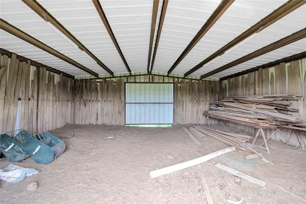 a view of a porch in front of the house