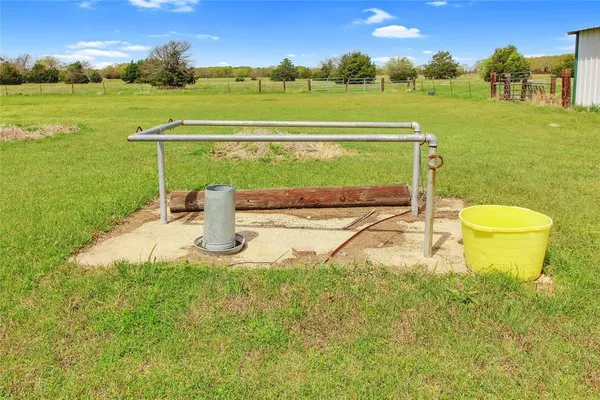 a view of outdoor space with deck and yard