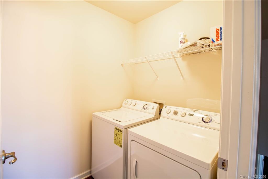 2279 Drake Mill Lane Southwest Concord, NC 28025 - Photo 30 of 40 a utility room with dryer and washer