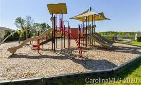 2279 Drake Mill Lane Southwest Concord, NC 28025 - Photo 37 of 40 a view of a park with swings