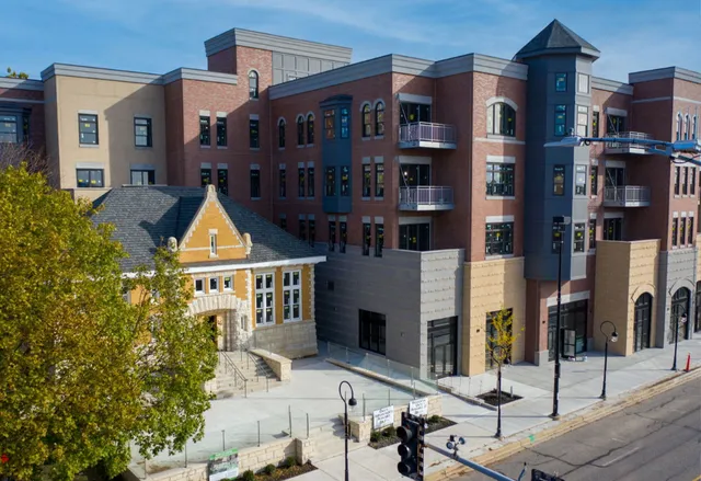 a workspace with furniture and window