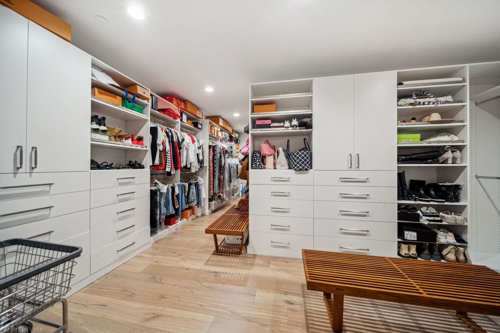 110 South Washington Street, Unit 400 Naperville, IL 60540 - Photo 18 of 34 a view of walk in closet with clothes and shoes