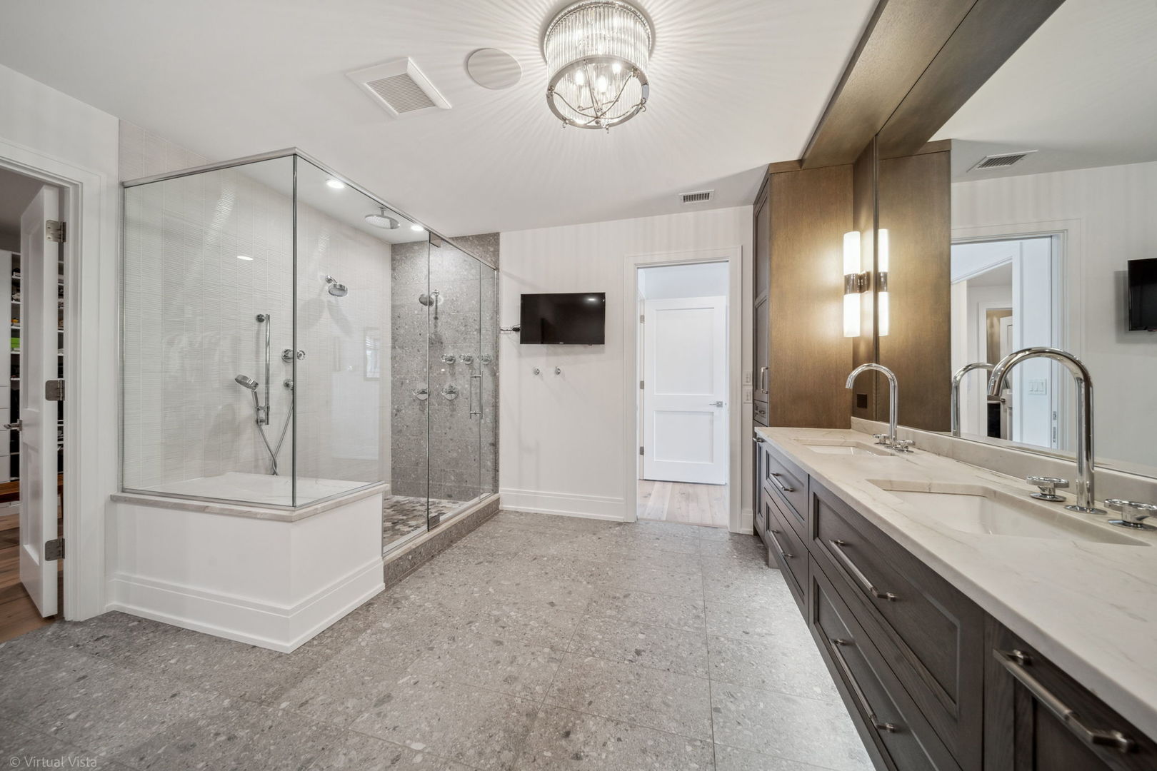 110 South Washington Street, Unit 400 Naperville, IL 60540 - Photo 19 of 34 a bathroom with a double vanity sink mirror double and shower