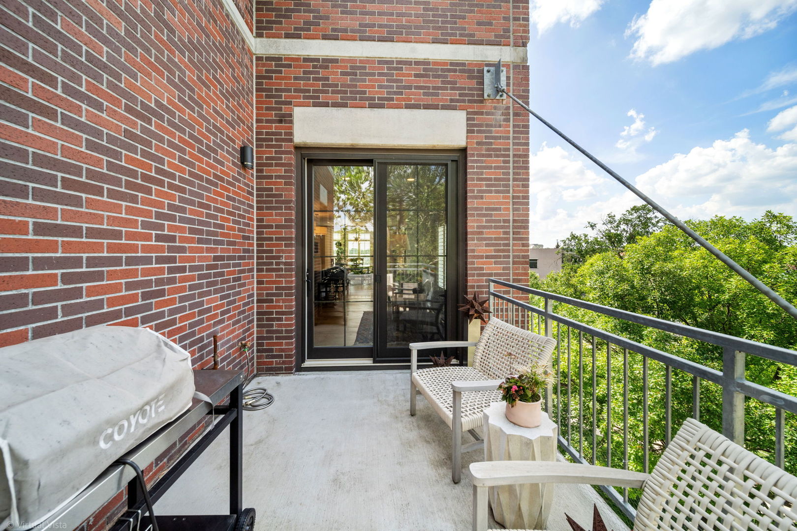 110 South Washington Street, Unit 400 Naperville, IL 60540 - Photo 28 of 34 a view of a chair and table in the balcony