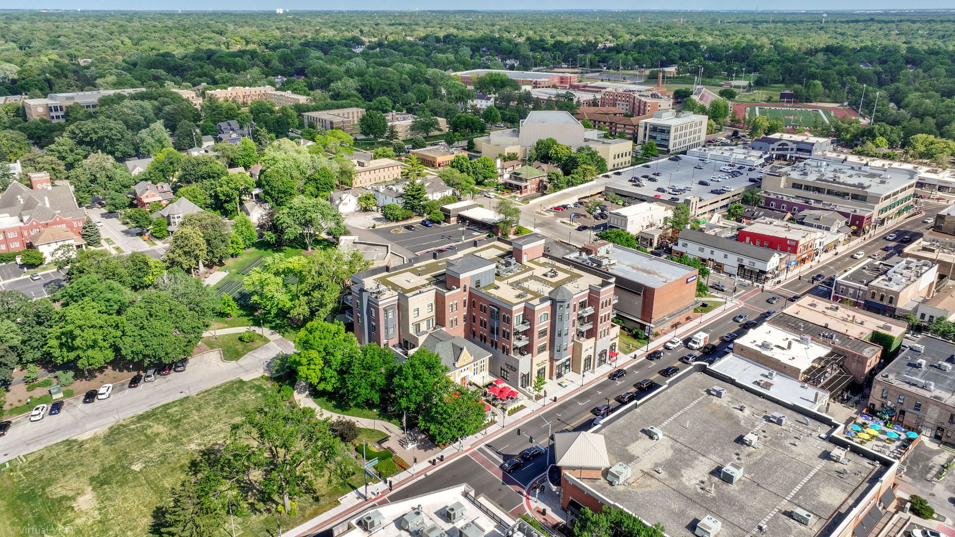 110 South Washington Street, Unit 400 Naperville, IL 60540 - Photo 33 of 34 an aerial view of a city with lots of residential buildings