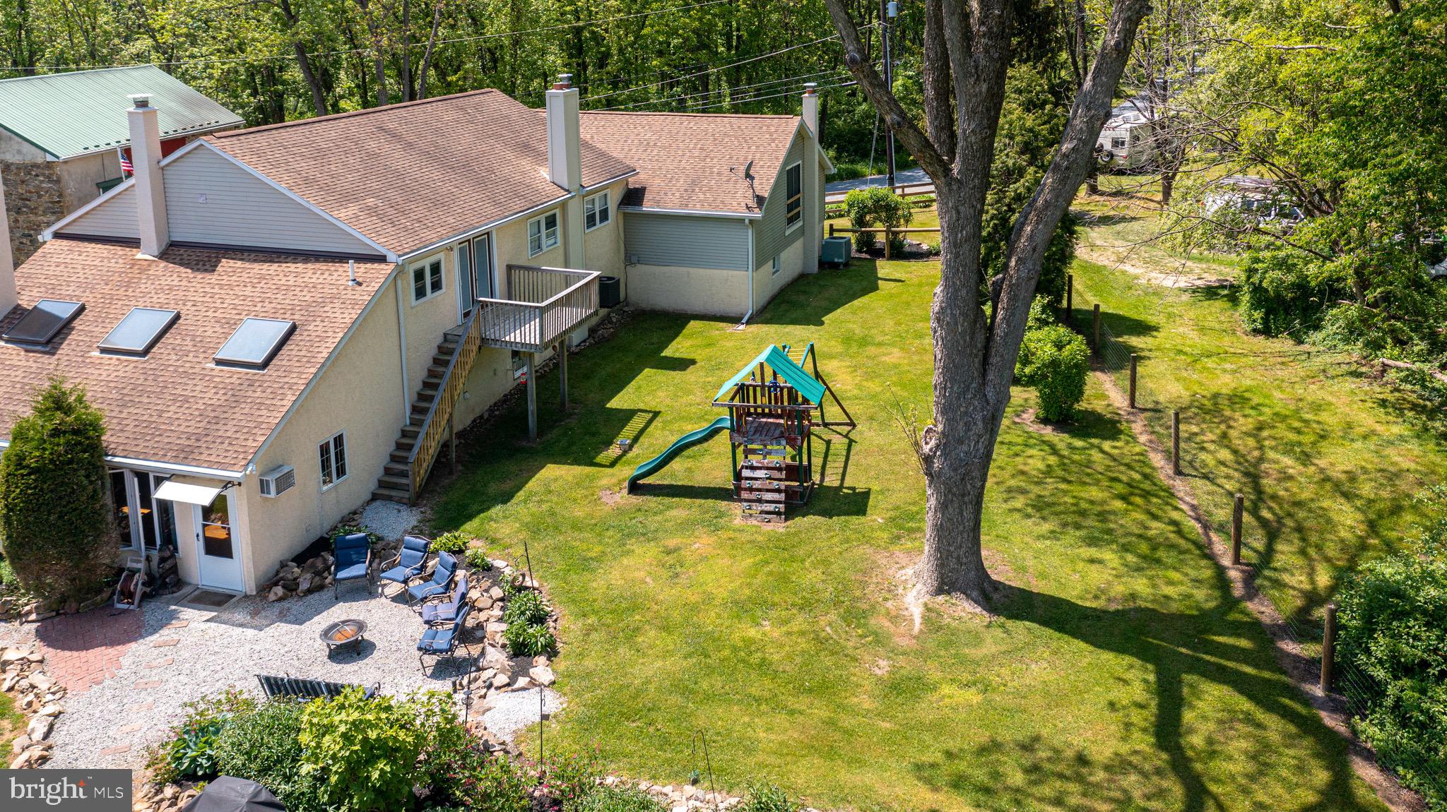 810 Delong Road Alburtis, PA 18011 - Photo 8 of 74 Rear Yard of Home, Walk Down Balcony Off Master