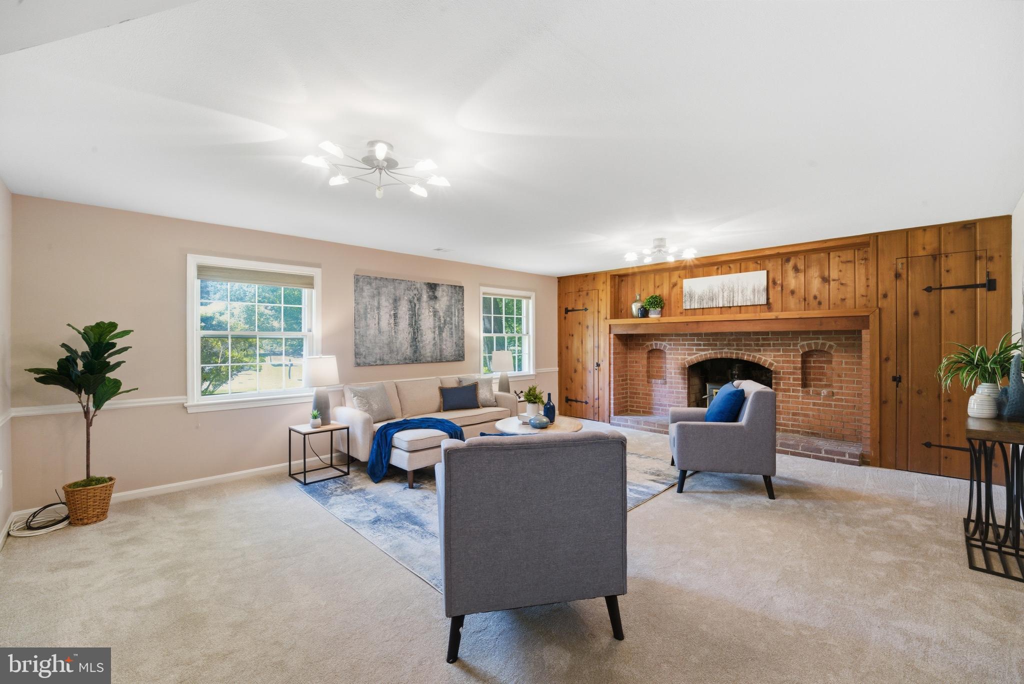 13309 Old Forge Road Silver Spring, MD 20904 - Photo 19 of 52 a living room with furniture and a fireplace