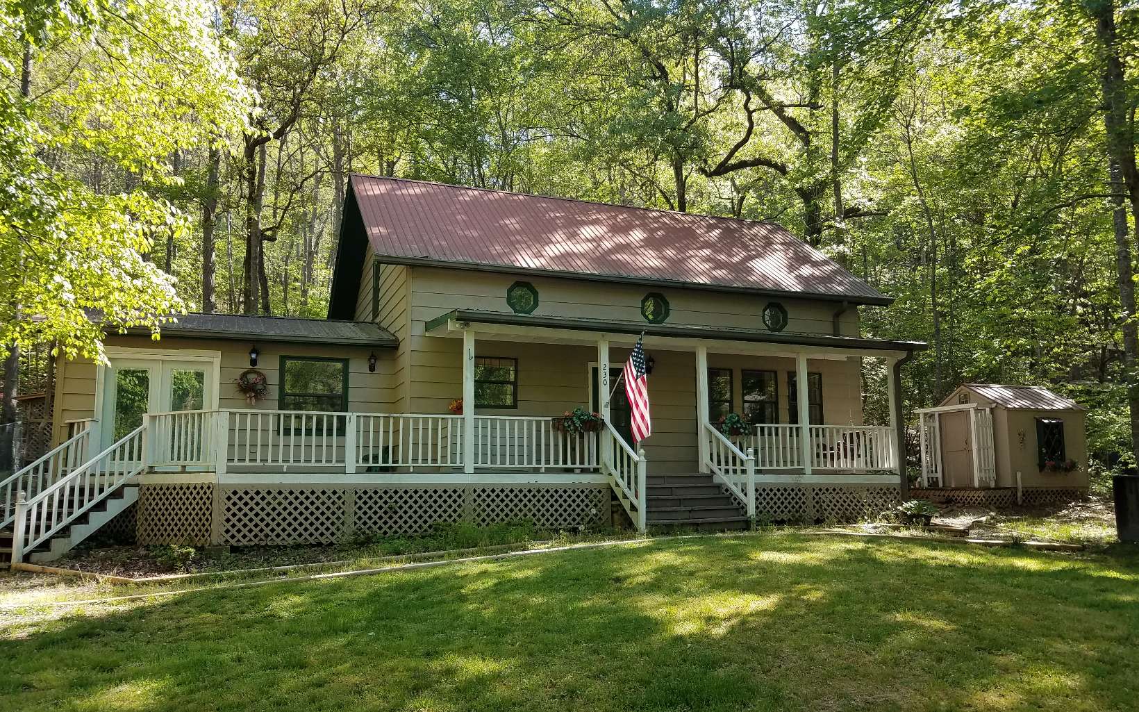 230 Paradise Road Murphy, NC 28906 - Photo 1 of 1 a view of a house with a yard and a large tree