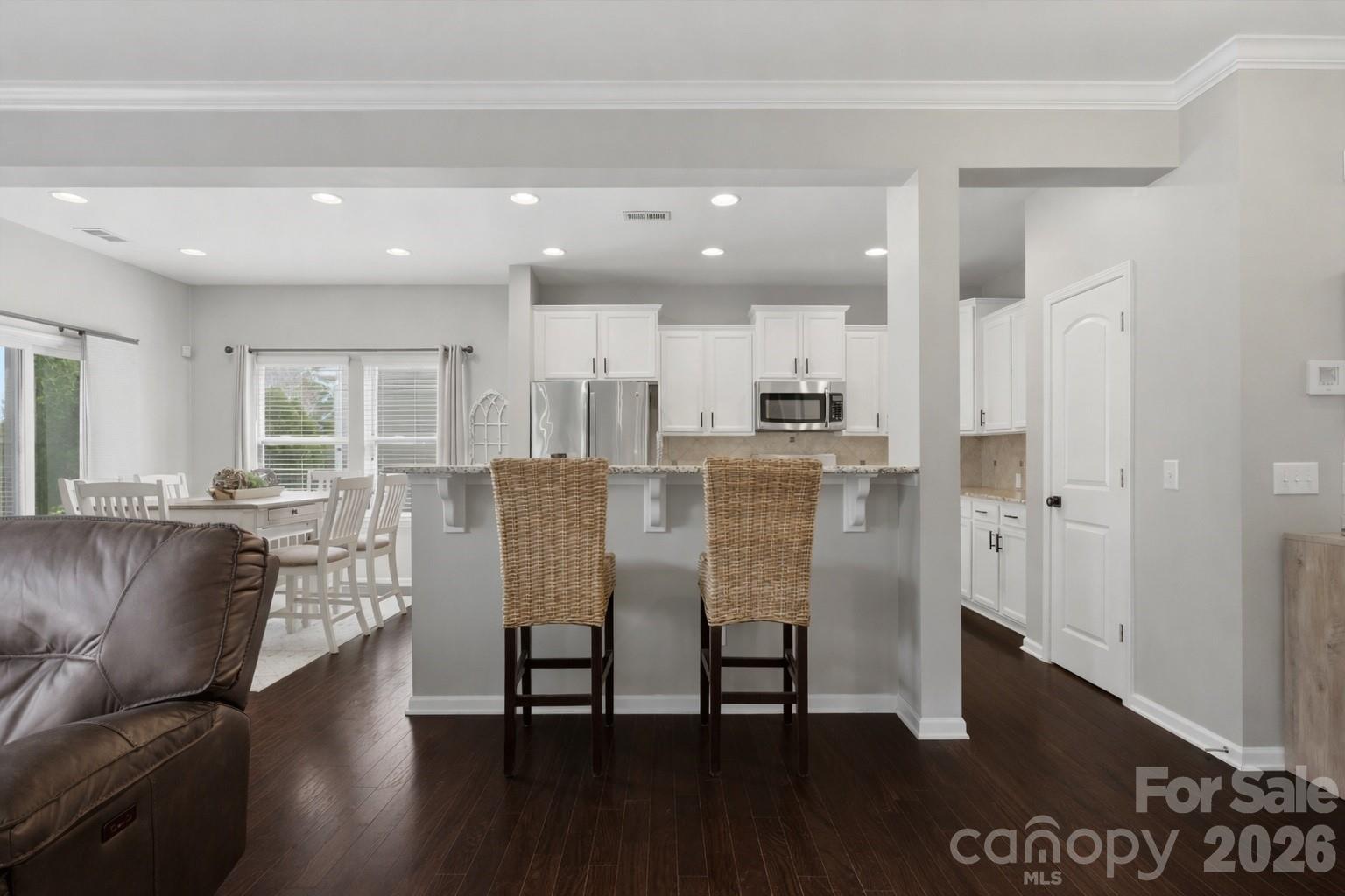 79321 Ridgehaven Road Lancaster, SC 29720 - Photo 11 of 35 a view of a dining room with furniture and wooden floor