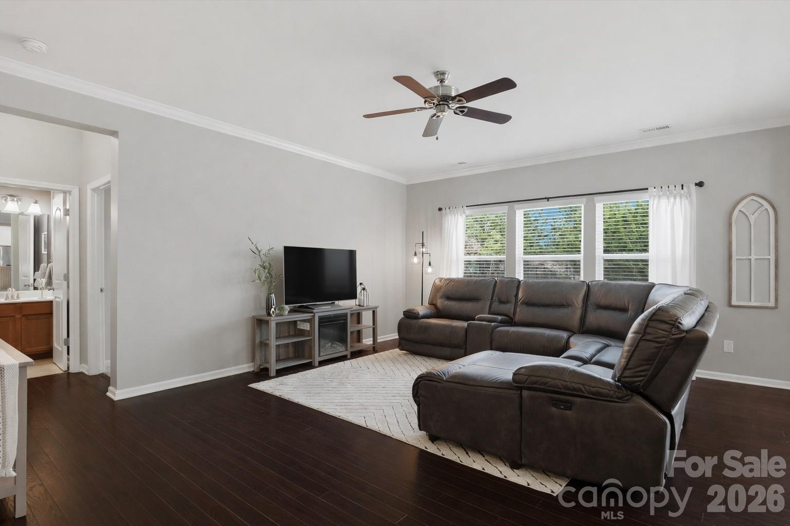79321 Ridgehaven Road Lancaster, SC 29720 - Photo 13 of 35 a living room with furniture a window and a flat screen tv