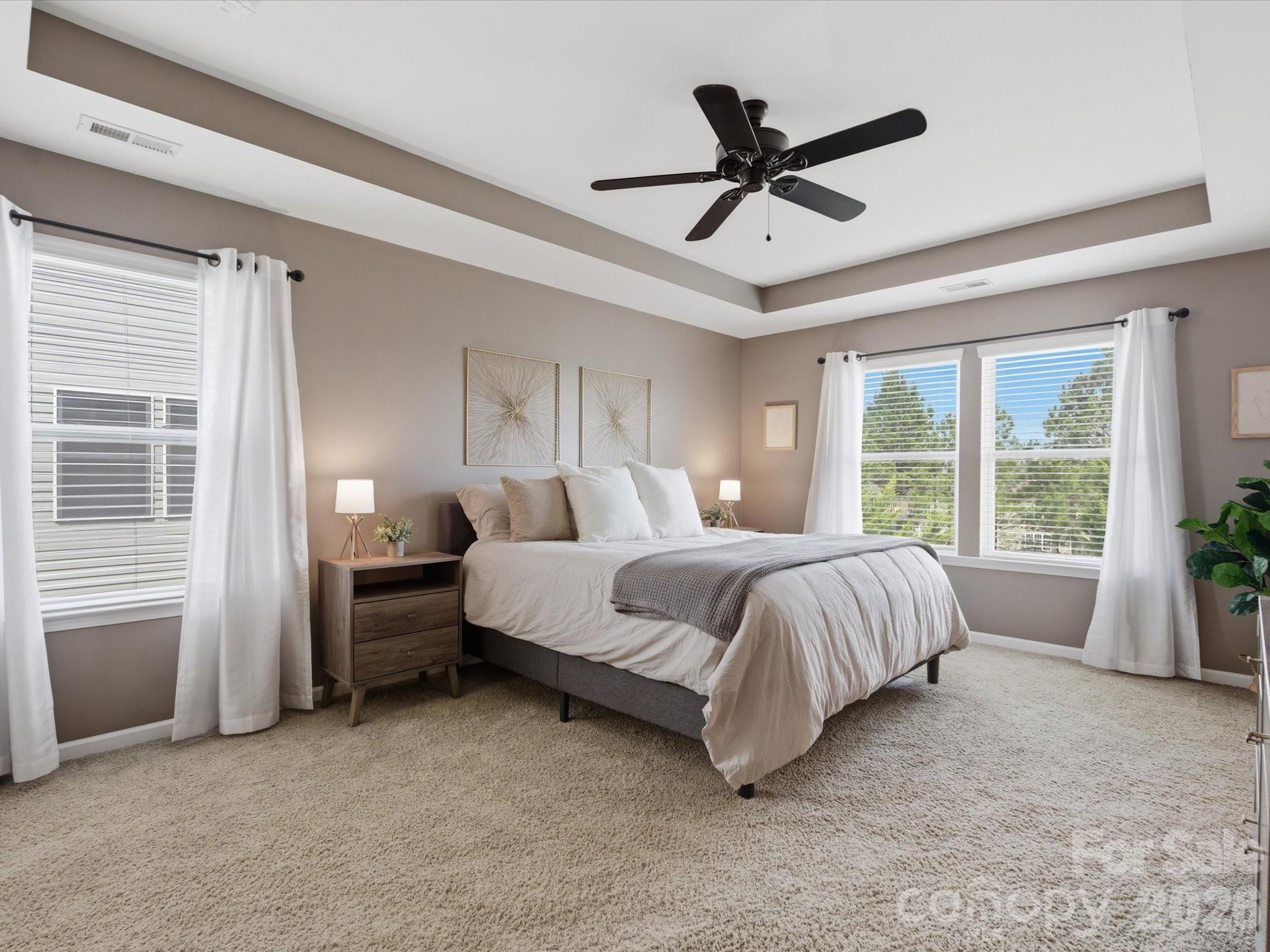 79321 Ridgehaven Road Lancaster, SC 29720 - Photo 19 of 35 a bed room with a bed and a ceiling fan