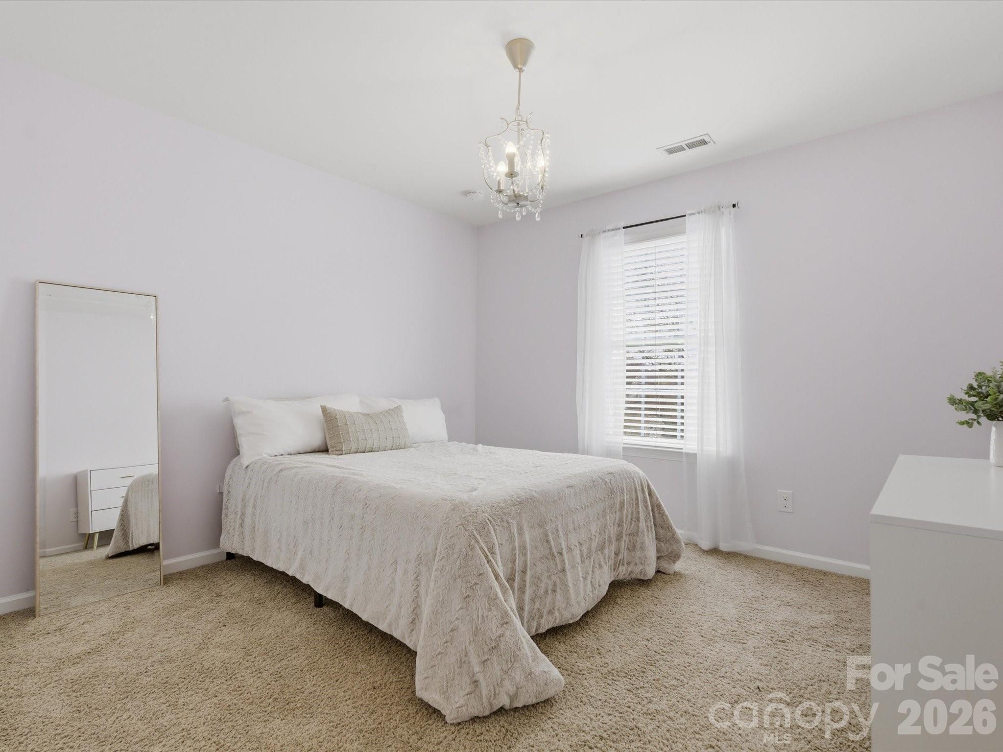 79321 Ridgehaven Road Lancaster, SC 29720 - Photo 29 of 35 a bedroom with bed and a window