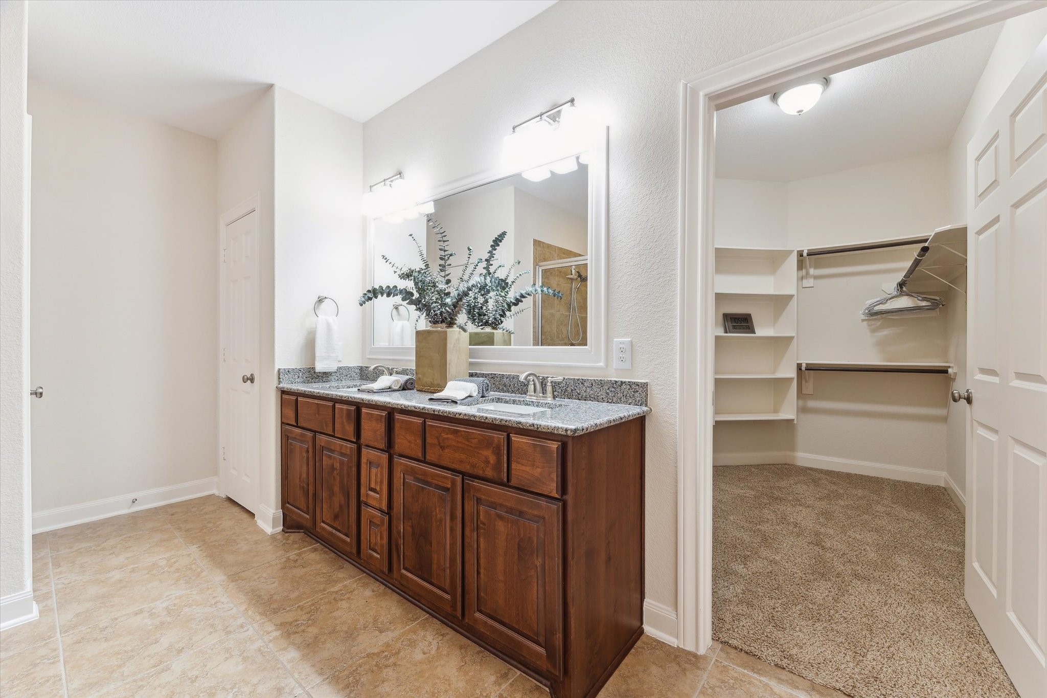 3850 Farm To Market 2917 Alvin, TX 77511 - Photo 14 of 30 a bathroom with a sink and a mirror