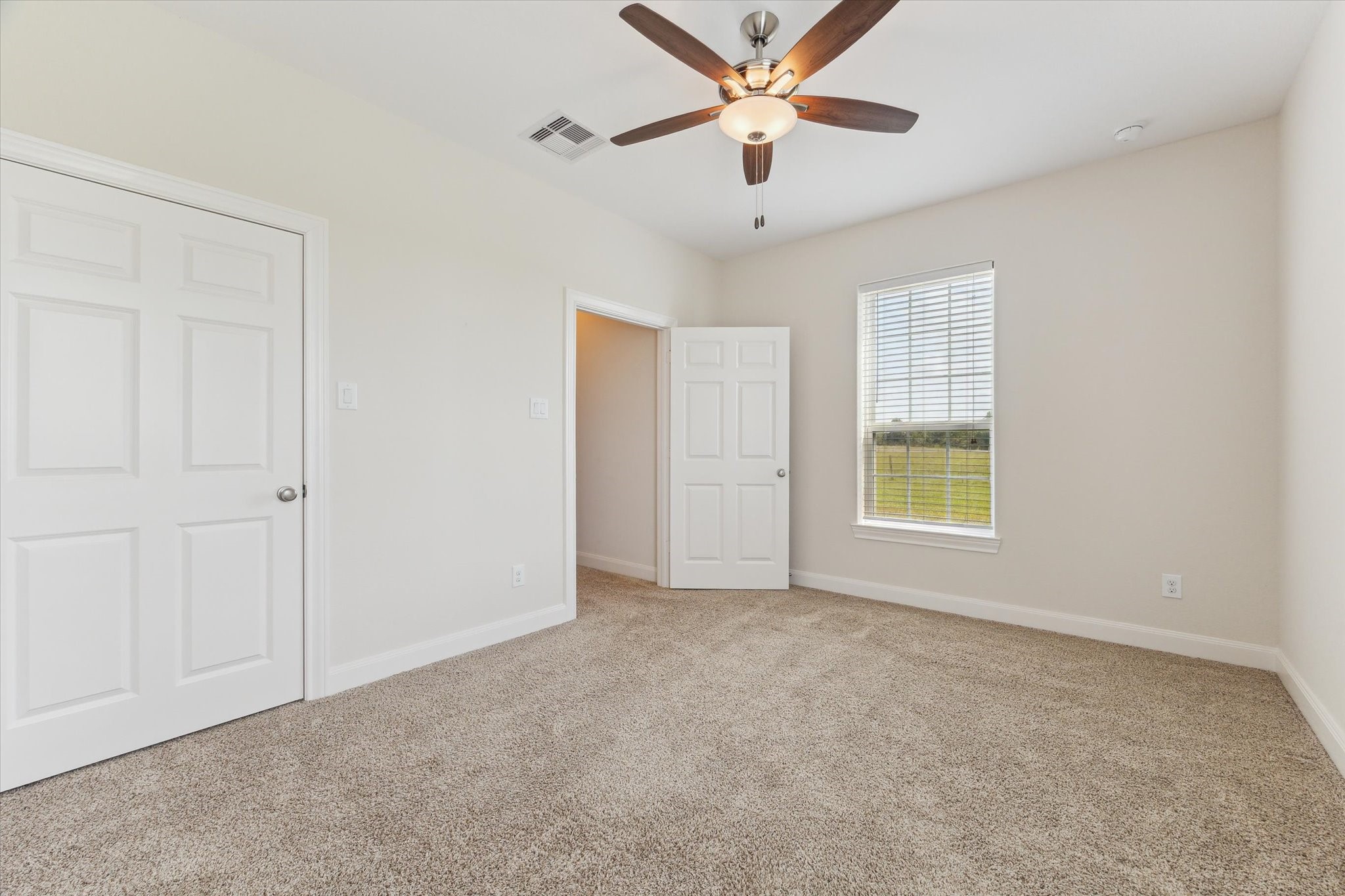 3850 Farm To Market 2917 Alvin, TX 77511 - Photo 21 of 30 a view of an empty room with a window