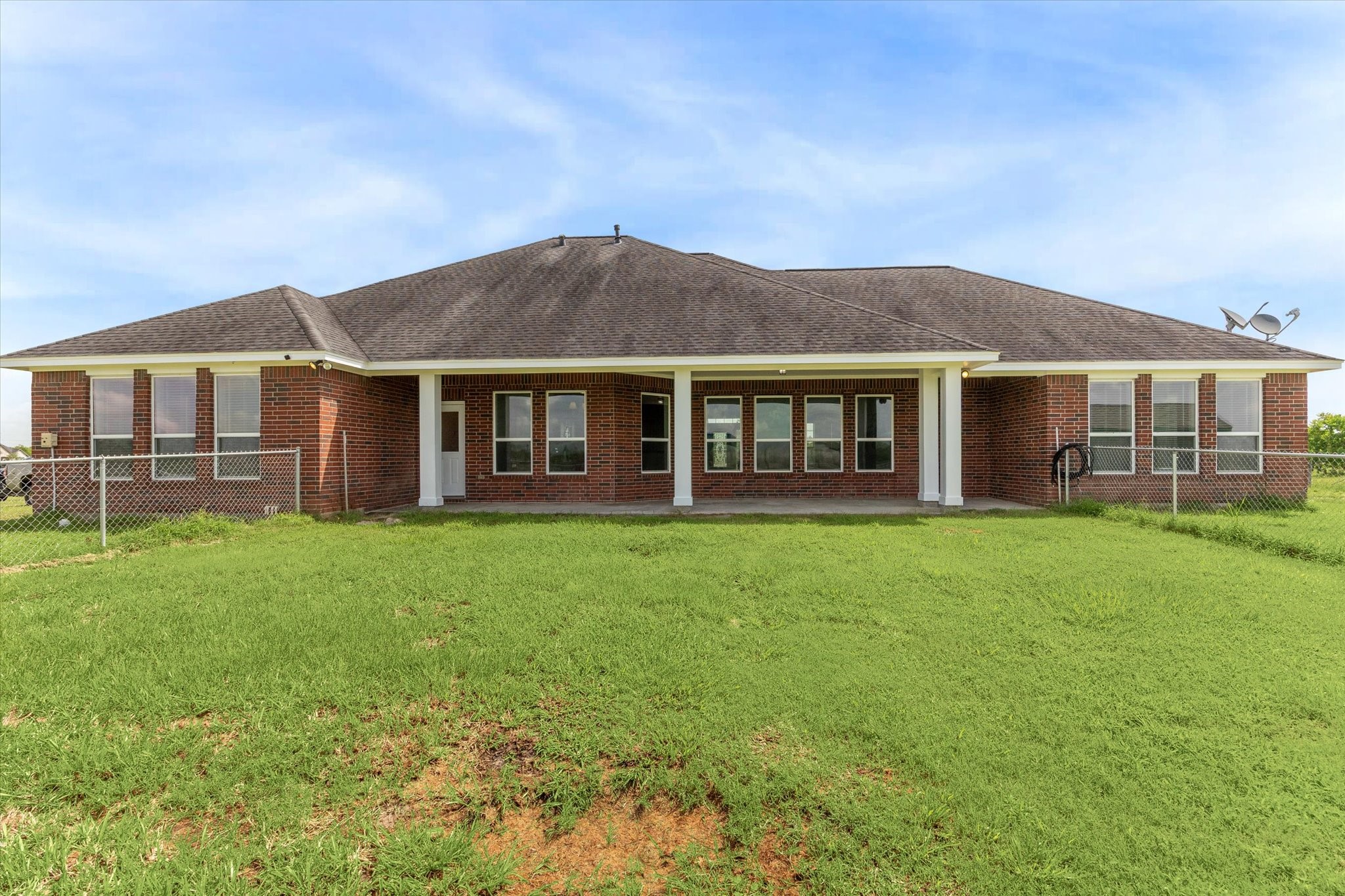 3850 Farm To Market 2917 Alvin, TX 77511 - Photo 27 of 30 front view of a house with a garden