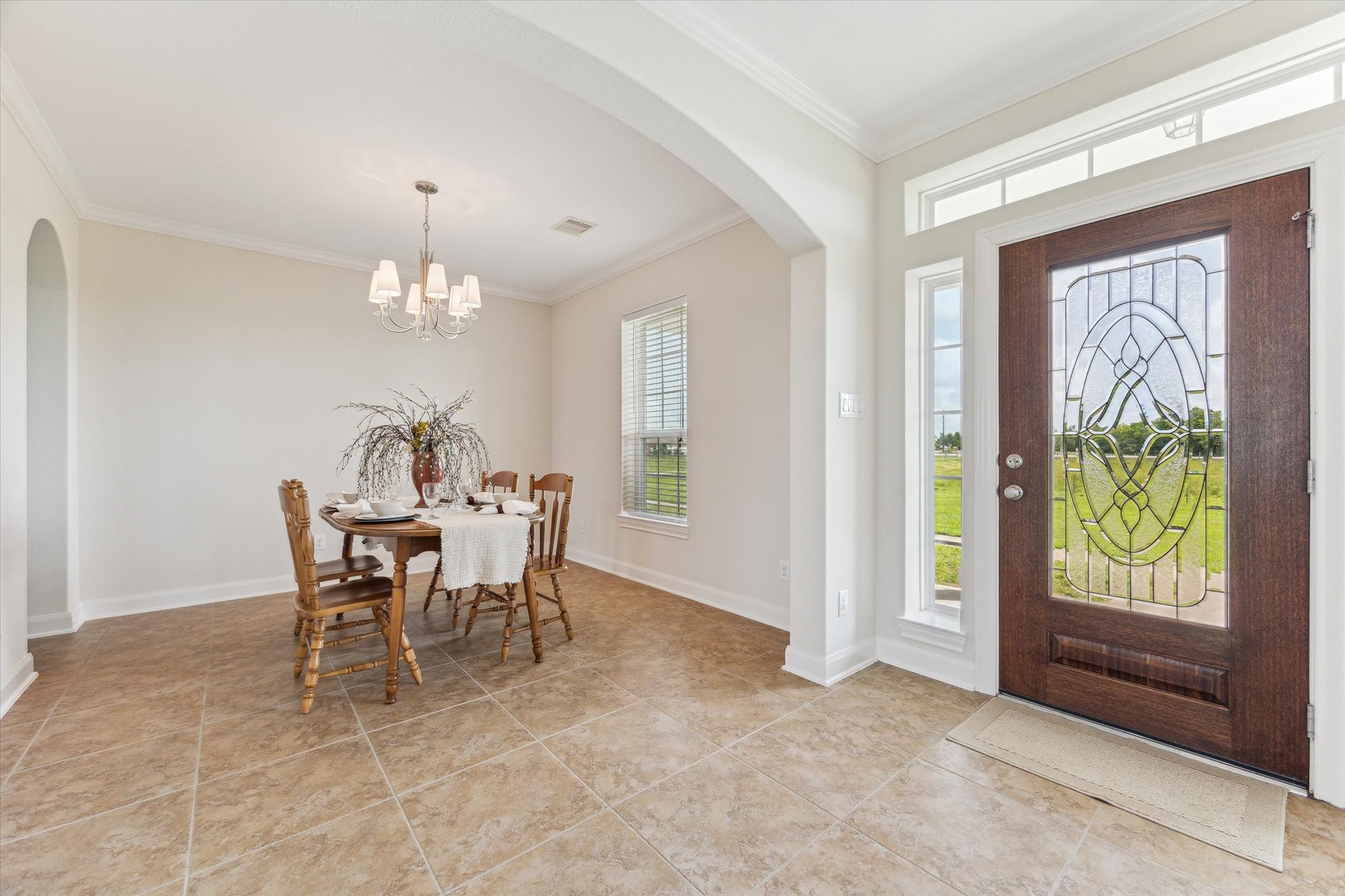 3850 Farm To Market 2917 Alvin, TX 77511 - Photo 4 of 30 a view of a dining room with furniture and chandelier