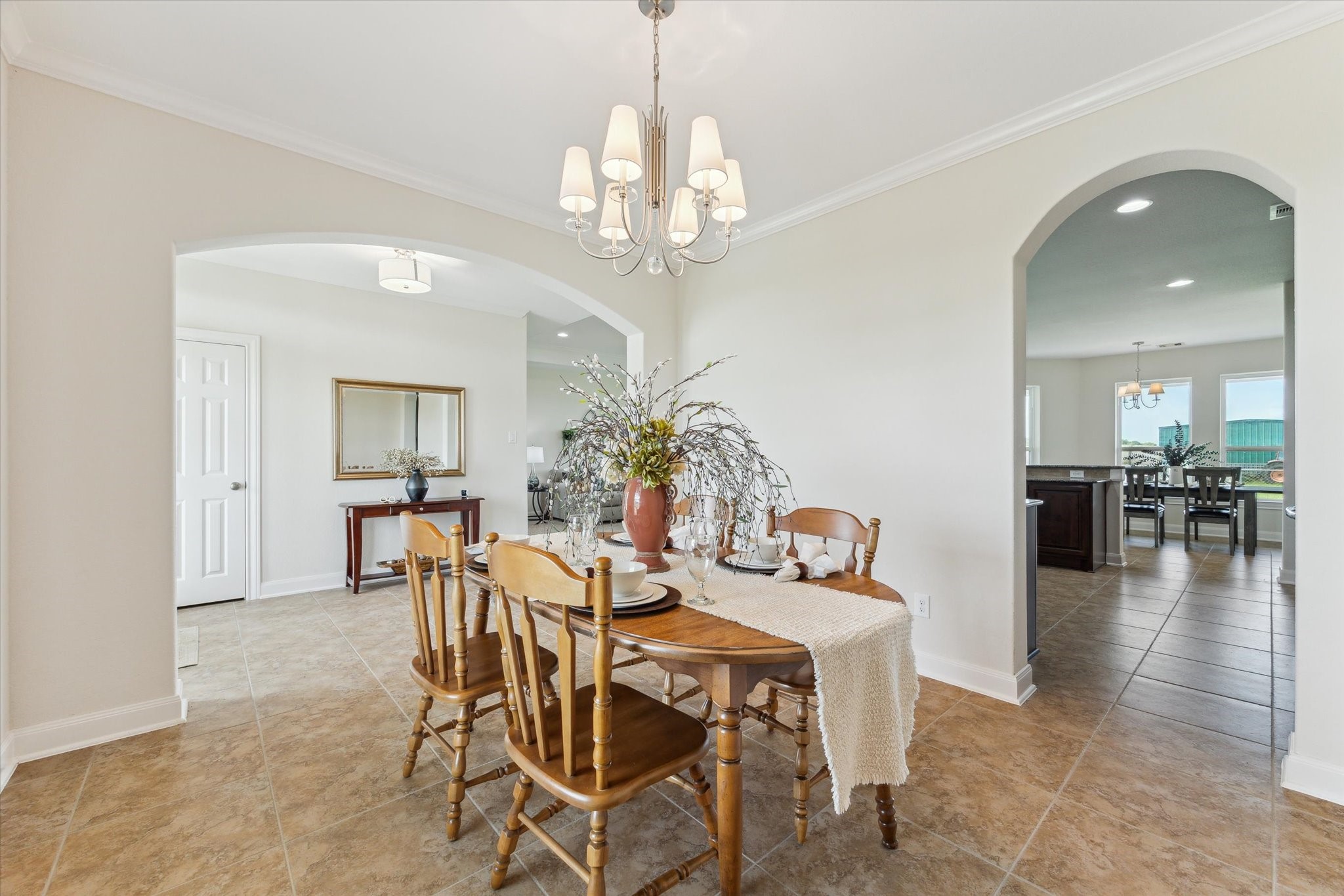 3850 Farm To Market 2917 Alvin, TX 77511 - Photo 5 of 30 a view of a dining room with furniture and chandelier