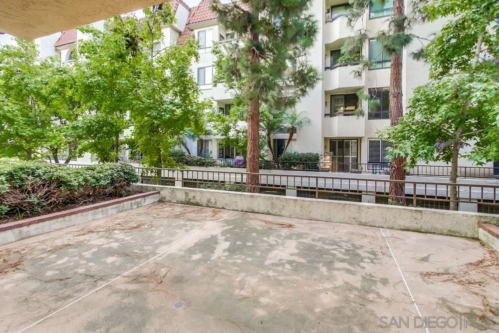 5865 Friars Road, Unit 3113 San Diego, CA 92110 - Photo 25 of 39 a view of residential house with stairs and trees around