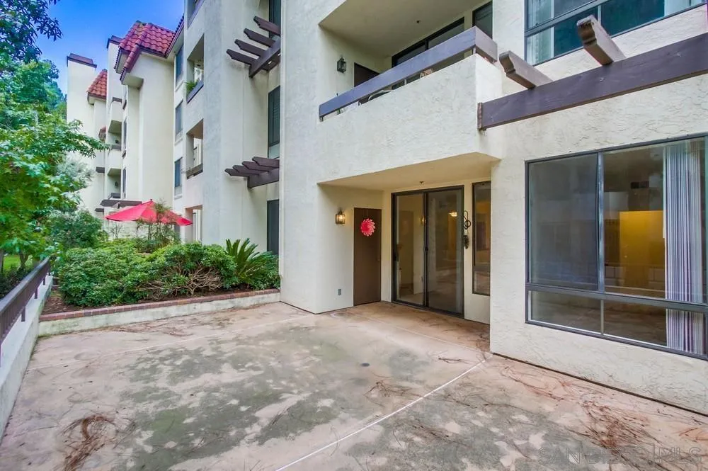5865 Friars Road, Unit 3113 San Diego, CA 92110 - Photo 26 of 39 a view of a building with flower pots