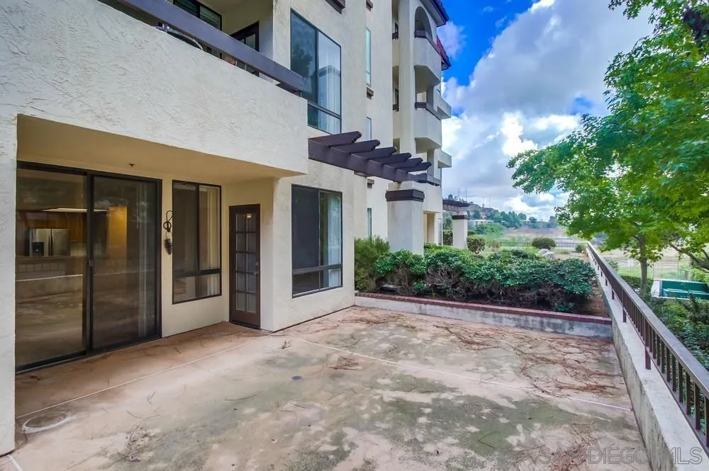 5865 Friars Road, Unit 3113 San Diego, CA 92110 - Photo 27 of 39 a view of a building with balcony