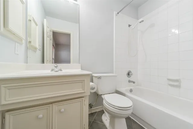 a bathroom with a sink a toilet and a bathtub