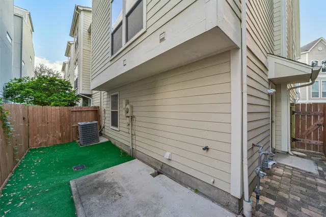 a view of a balcony with wooden floor