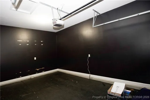 a room with furniture and gym equipment