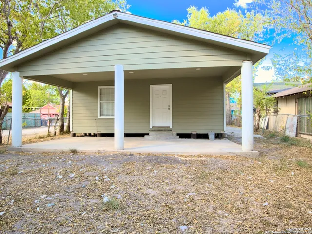 a view of a house with a patio