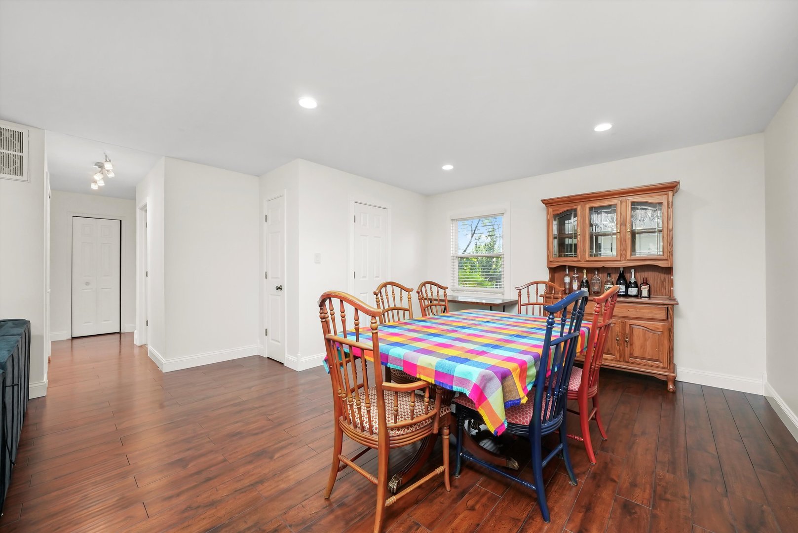 836 Bonita Avenue Elk Grove Village, IL 60007 - Photo 13 of 41 a view of a dining room with furniture and wooden floor