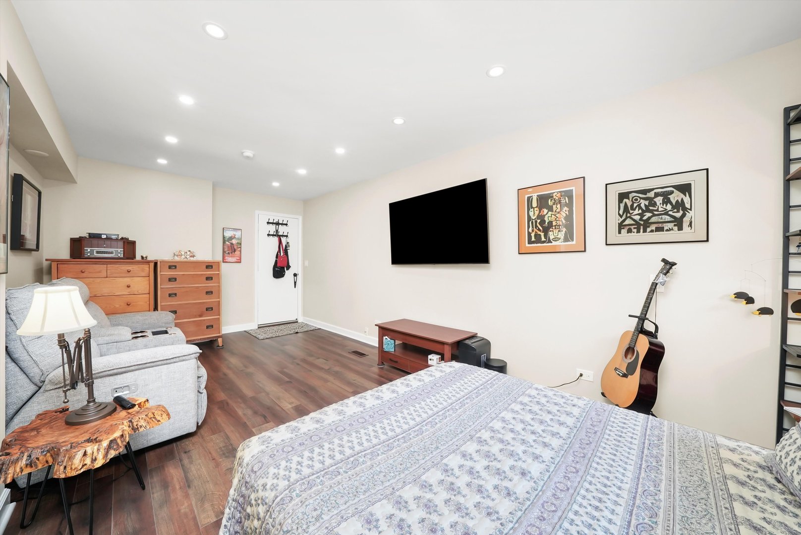 836 Bonita Avenue Elk Grove Village, IL 60007 - Photo 22 of 41 a bedroom with furniture and a flat screen tv