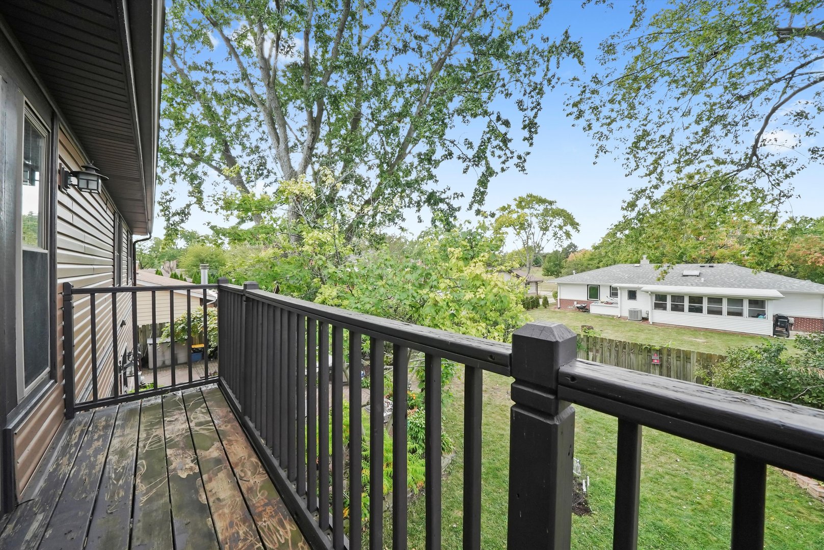 836 Bonita Avenue Elk Grove Village, IL 60007 - Photo 27 of 41 a view of a balcony with wooden floor