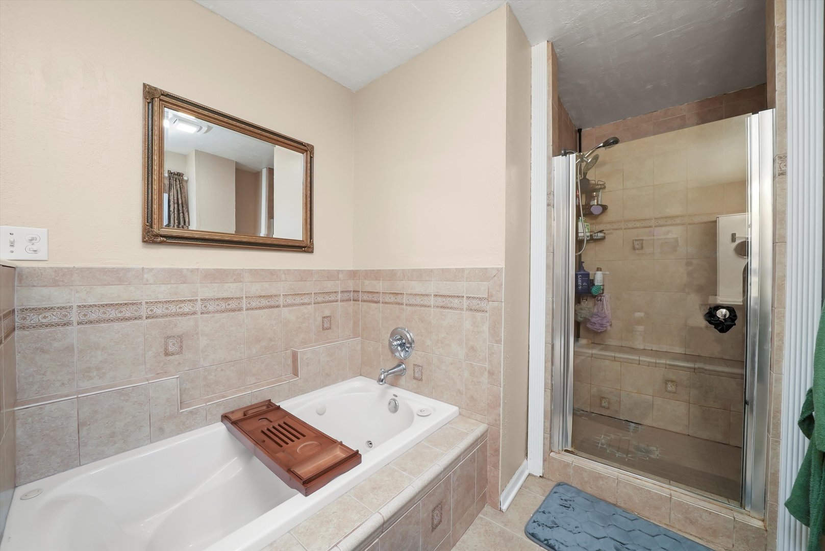 836 Bonita Avenue Elk Grove Village, IL 60007 - Photo 30 of 41 a bathroom with a tub sink and shower