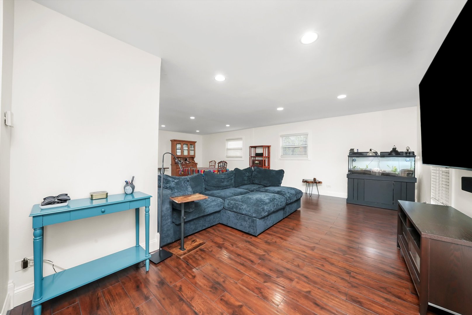 836 Bonita Avenue Elk Grove Village, IL 60007 - Photo 6 of 41 a living room with furniture and a flat screen tv