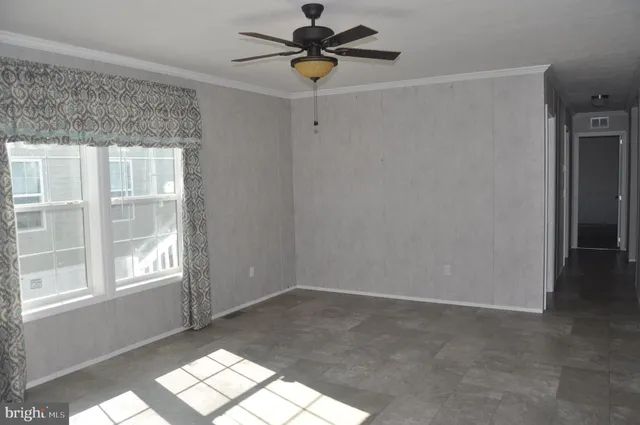 a view of a window in an empty room