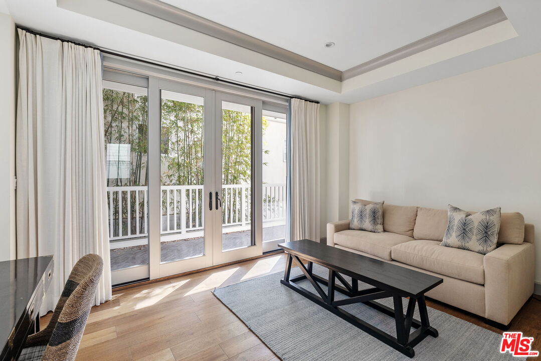 703 Bayview Drive Manhattan Beach, CA 90266 - Photo 22 of 36 a living room with furniture and a window