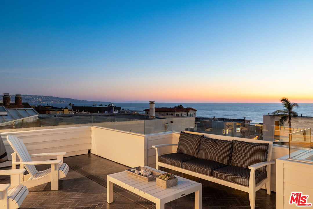 703 Bayview Drive Manhattan Beach, CA 90266 - Photo 33 of 36 a view of a terrace with chairs