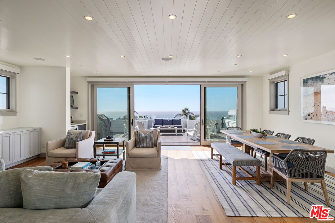 703 Bayview Drive Manhattan Beach, CA 90266 - Photo 5 of 36 a living room with furniture and a large window