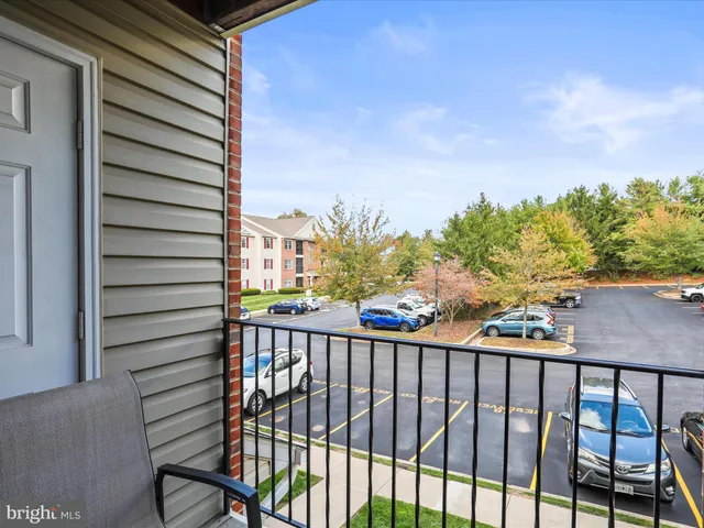 a view of a balcony with an outdoor space