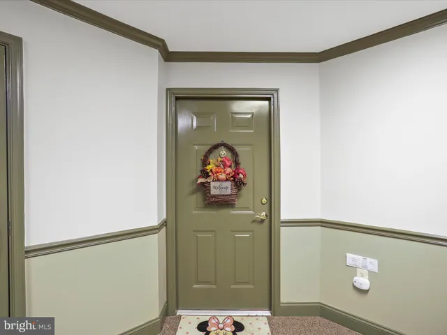 a bathroom with a shower and a sink