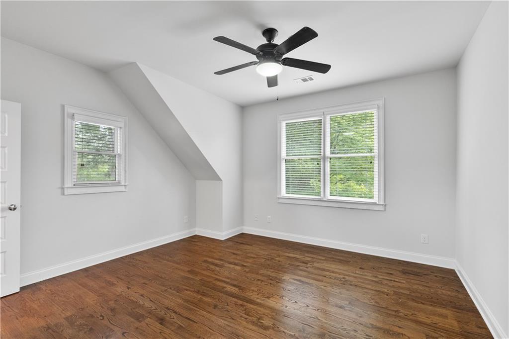 211 West Hill Street Decatur, GA 30030 - Photo 30 of 43 a view of a livingroom with a ceiling fan and window