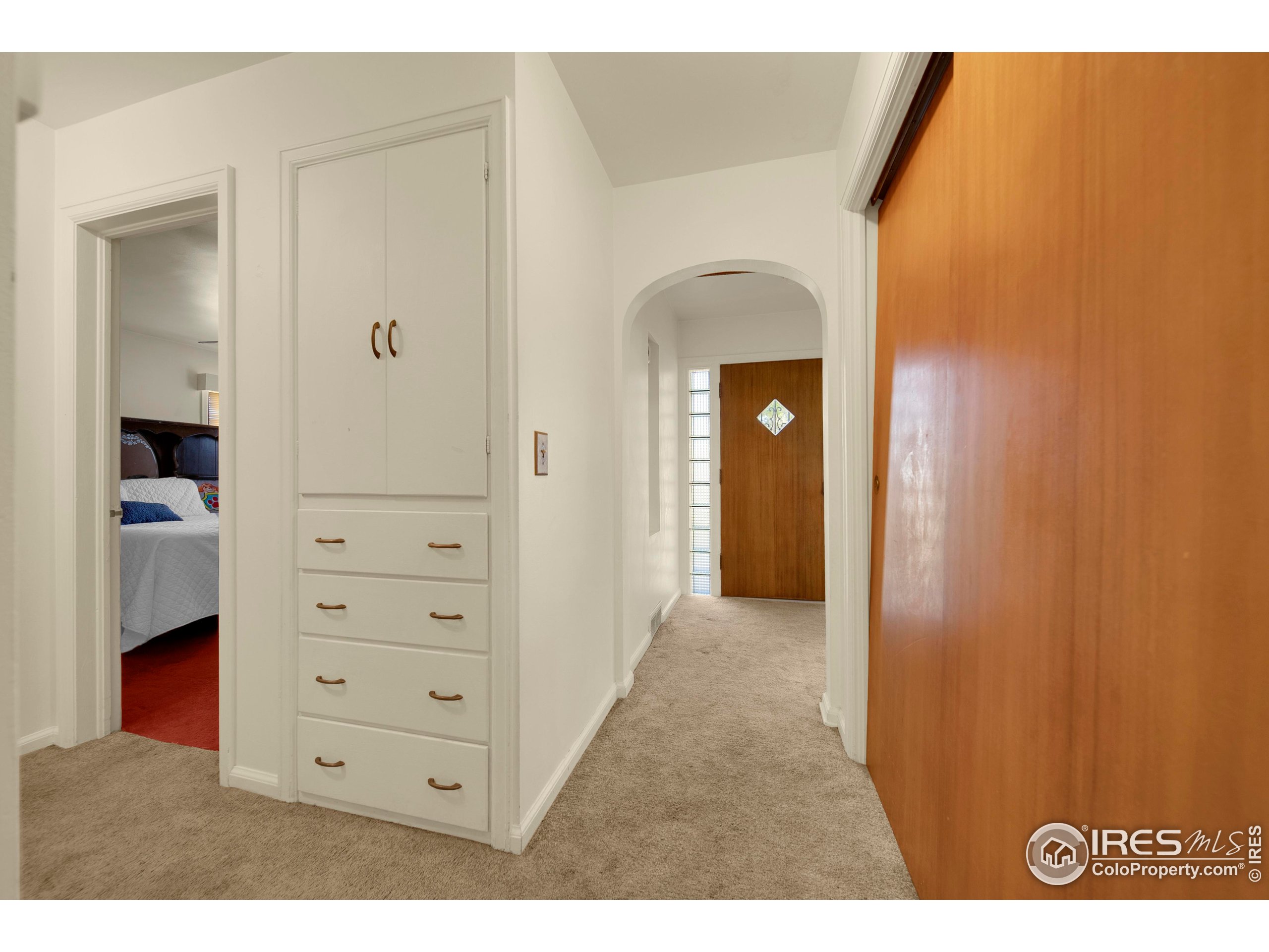 724 Carson Street Brush, CO 80723 - Photo 12 of 29 hallway with wooden floor