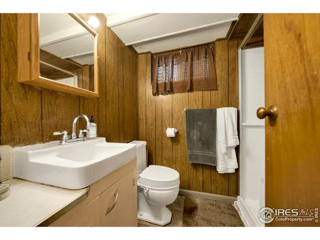 a living room with a couch and a flat screen tv