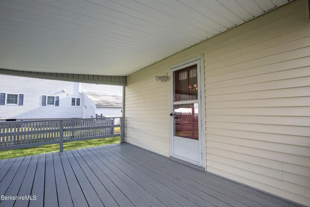 a view of a livingroom with wooden floor