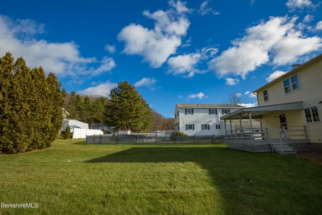 a view of a house with a big yard