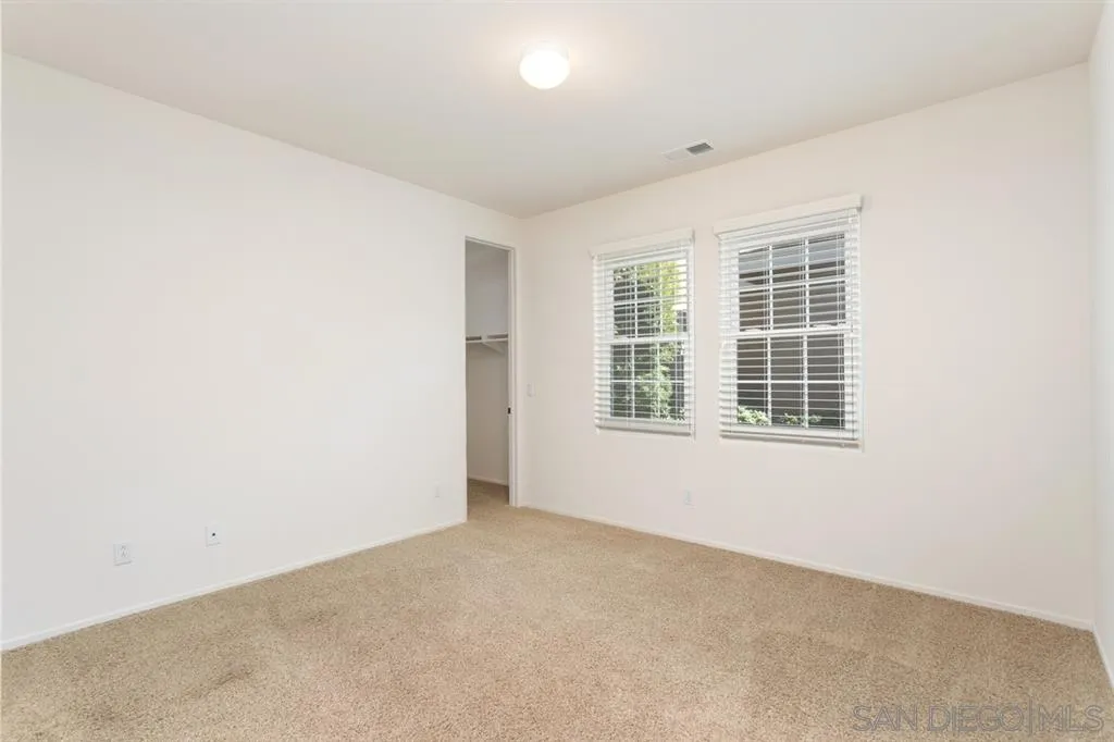 1757 Monte Mar Road Vista, CA 92084 - Photo 13 of 25 an empty room with windows