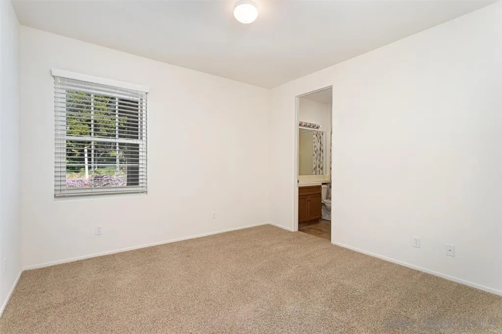 1757 Monte Mar Road Vista, CA 92084 - Photo 14 of 25 a view of an empty room with a window