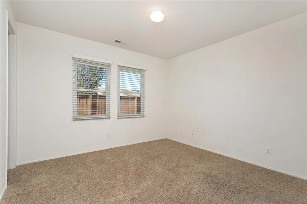 1757 Monte Mar Road Vista, CA 92084 - Photo 15 of 25 an empty room with a window