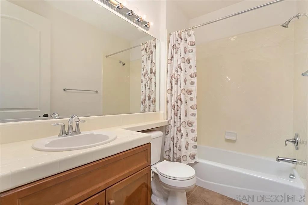 1757 Monte Mar Road Vista, CA 92084 - Photo 19 of 25 a bathroom with a sink toilet and shower
