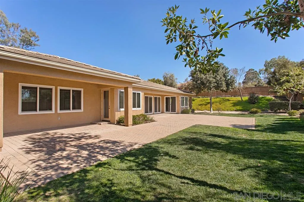 1757 Monte Mar Road Vista, CA 92084 - Photo 23 of 25 a front view of a house with a garden